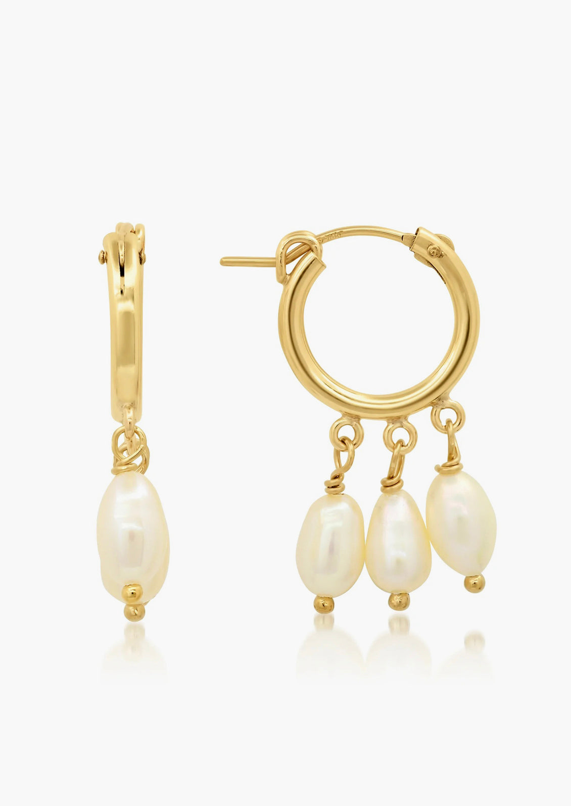 A pair of gold hoop earrings with three dangling pearls on each.