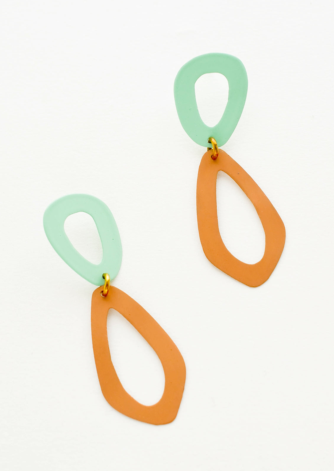 Two toned figure eight drop earrings in mint and mustard. 