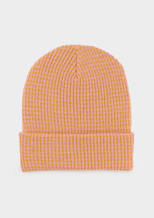A rib knit beanie in light peach and brown.