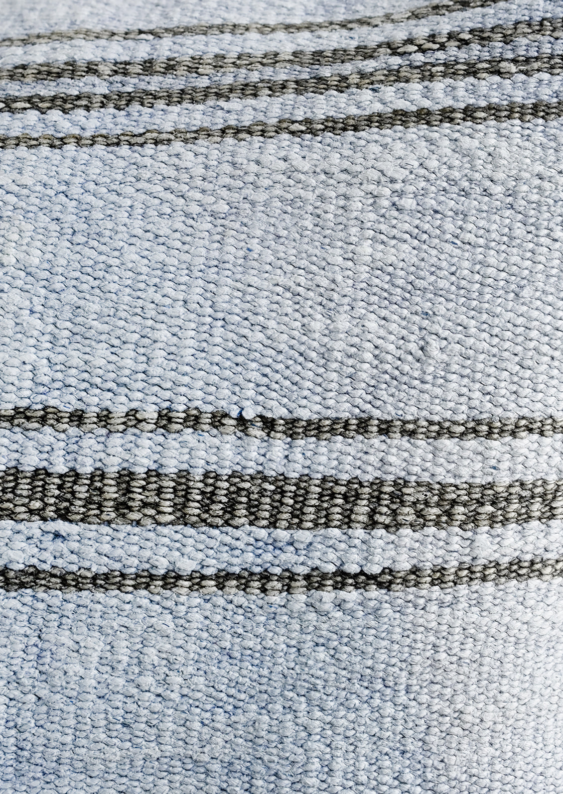 Vintage light blue hemp with charcoal stripes.