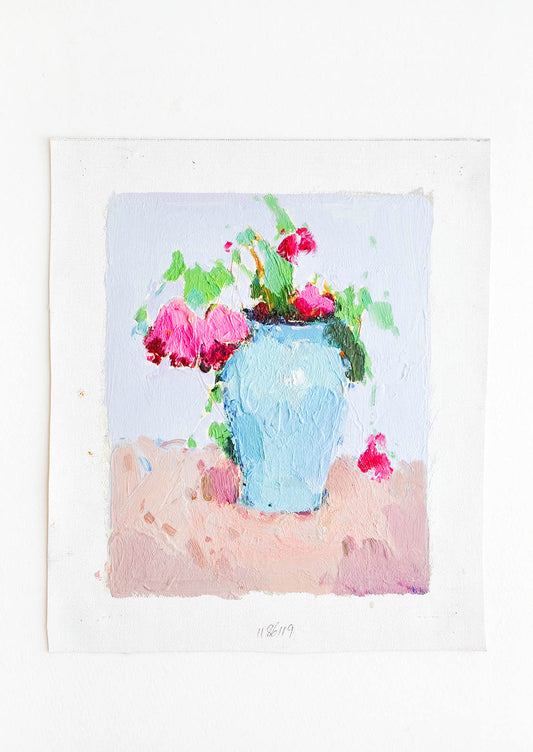 A painterly still life of pink flowers in a blue vase.