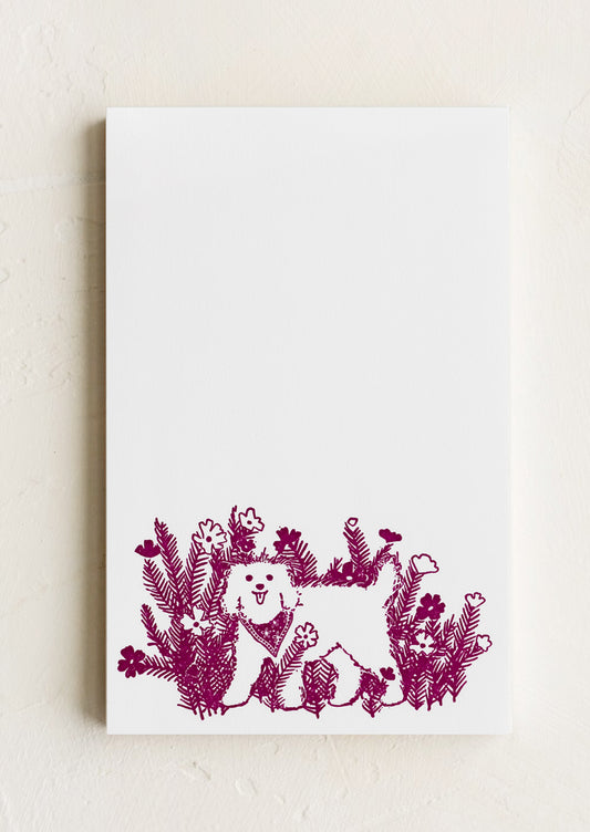 A notepad with purple dog.