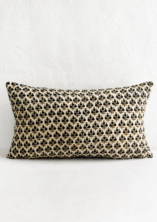 A block printed lumbar pillow.